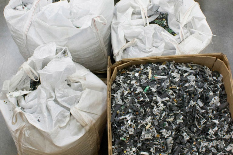 Shredded material prepared for shipment to downstream vendor